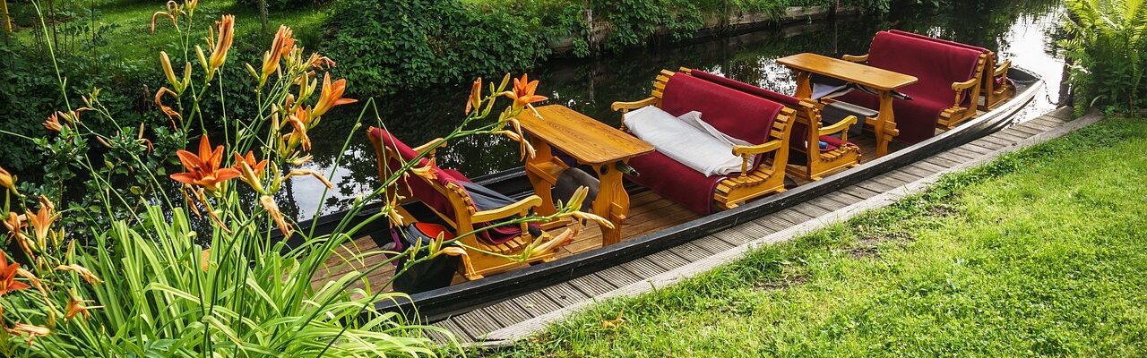 Boat trip through the channels of The UNESCO biosphere reserve Spreewald.
